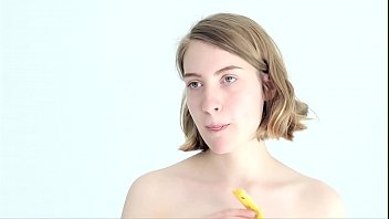 Blonde Bombshell Teasingly Handles A Banana