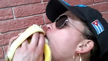 Young Woman Demonstrates Her Talent With A Banana