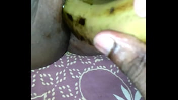 Young Tamil Woman Enjoys Banana Playfully