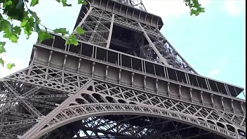 Intimate Encounter Near The Eiffel Tower In Paris, France, Involving A Woman And Two Men