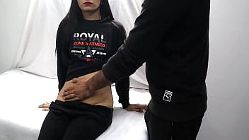 Medical Professional Performs Initial Gynecological Examination On Young Patient