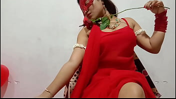 Sensual Indian Bhabhi In Red Sari Flaunts Curves While Marking Anniversary